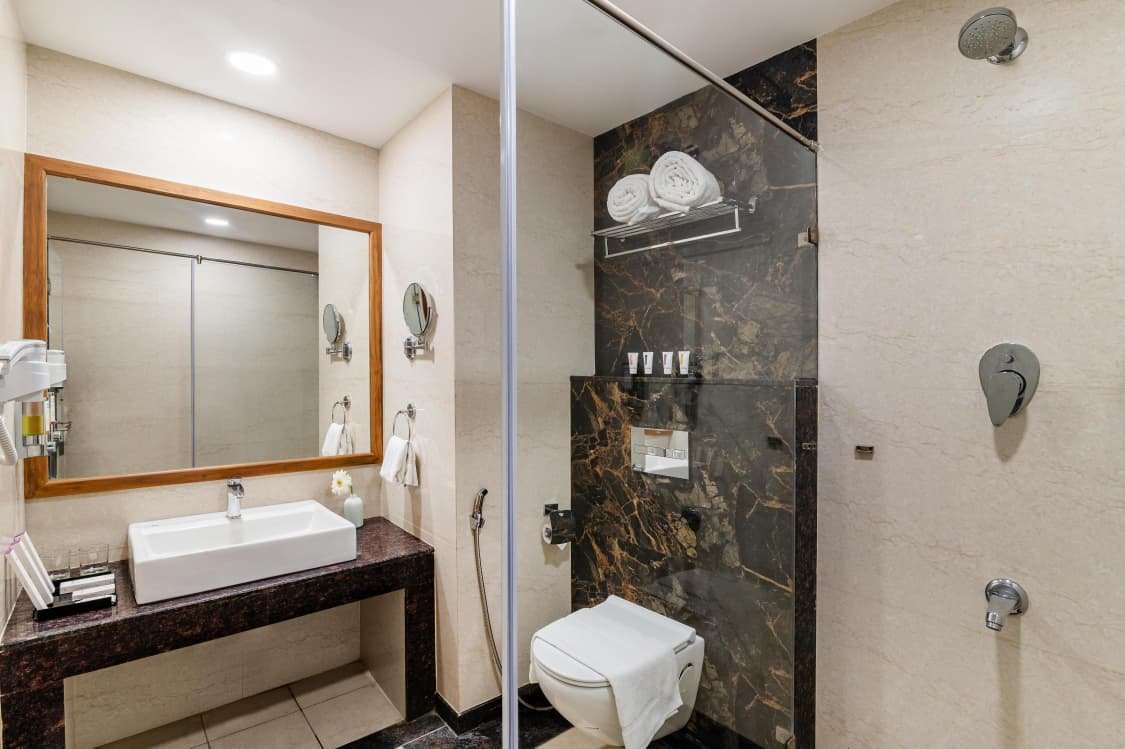 Ganesha sadan washroom deluxe ac room